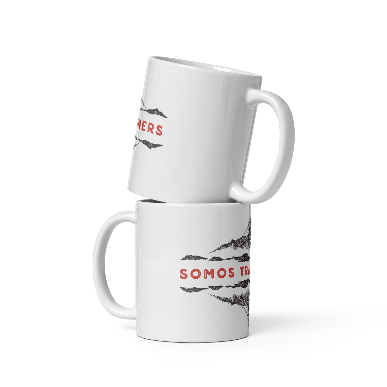 Dos tazas trail running apiladas mostrando diseño de montañas y texto Somos Trail Runners sobre fondo blanco