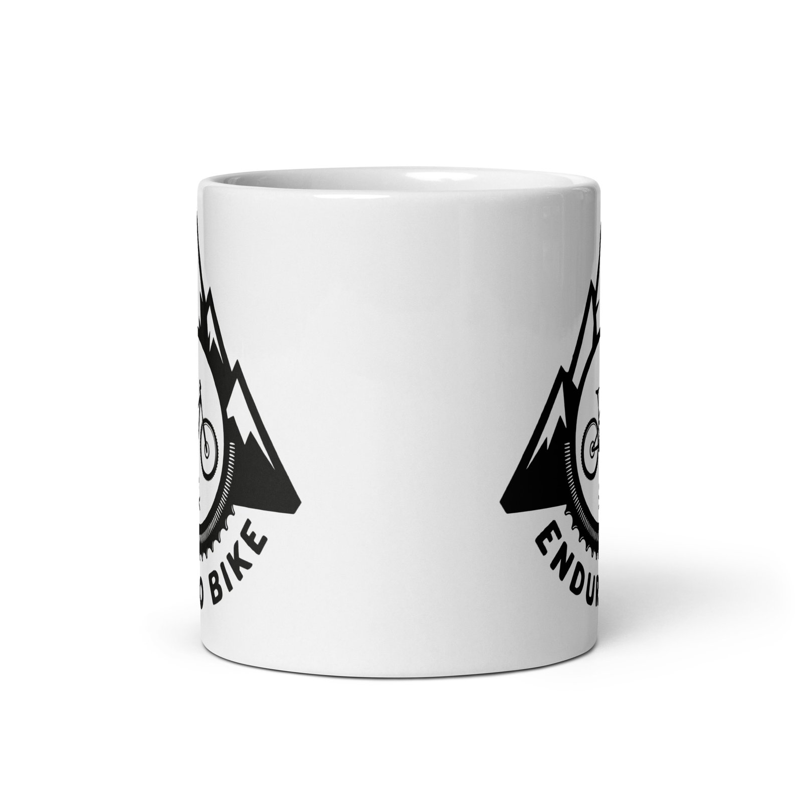 Taza Enduro Bike de cerámica blanca vista frontal con diseño de bicicleta y montañas